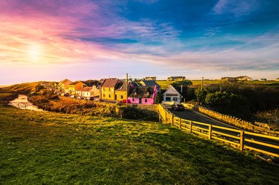 sunset on coloured cottages