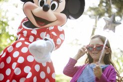 Girl and Minnie Mouse at Disneyland