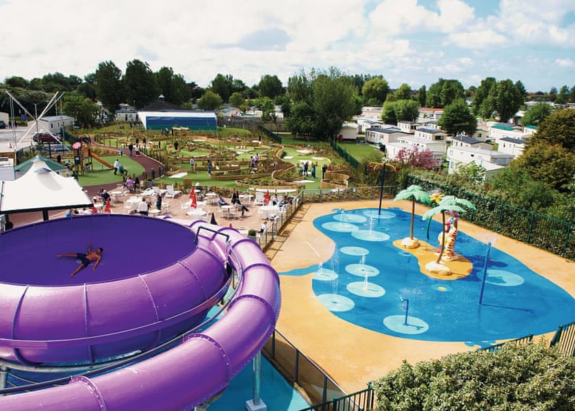 Swimming pool and rides at accessible holiday park in Lancashire