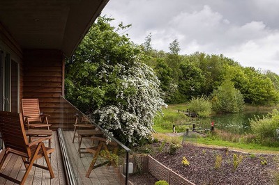 View of accessible fishing lake from hotel balcony in Norfolk