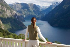 Tourist admiring the Norwegian Fjords