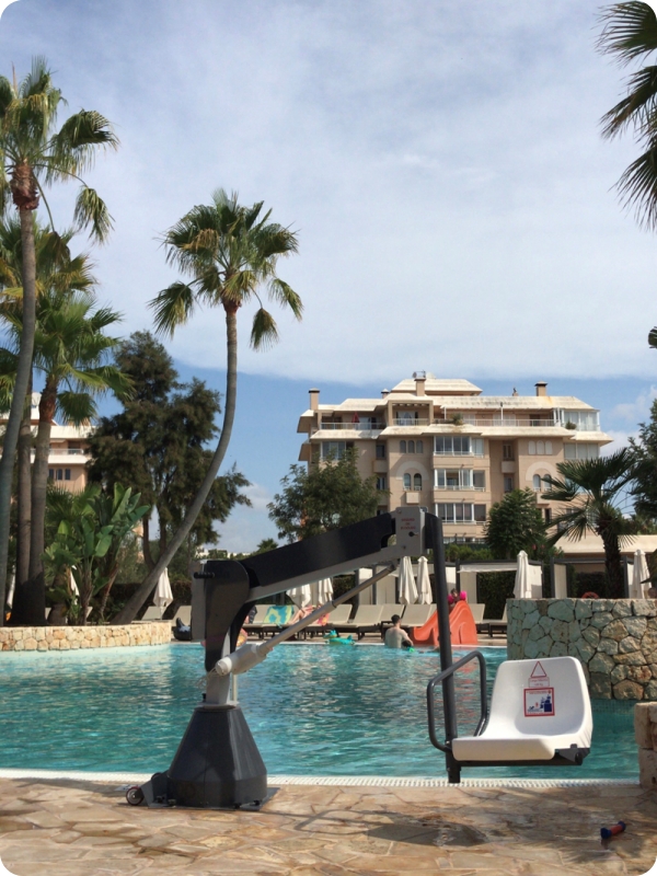 Swimming pool hoist at accessible hotel in Sa Coma, Majorca