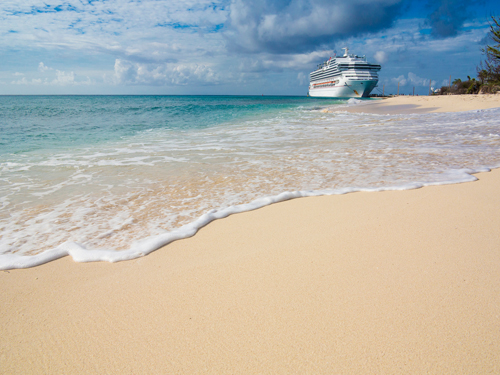 A cruise ship approaching the fine sands of Grand Turk Island in the Caribbean