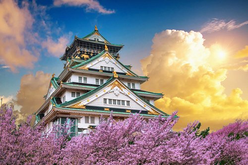 Osaka Castle among cherry blossoms in Osaka, Japan