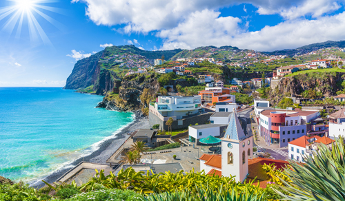 Port town overlooking the blue sea in Madeira