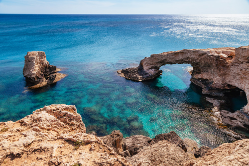 Rock arch in blue sea near Ayia Napa, Cyprus