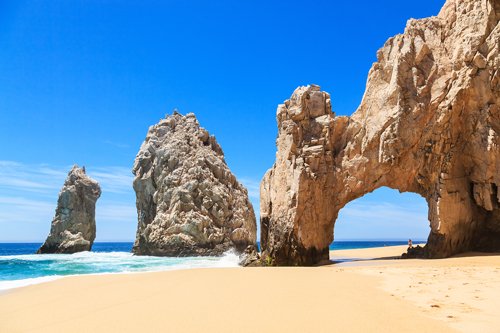 Rock arch and sandy beach in Cabo San Lucas, Mexico