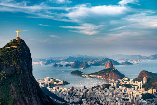Christ the Redeemer statue overlooking Rio de Janeiro and Sugarloaf Mountain, Brazil