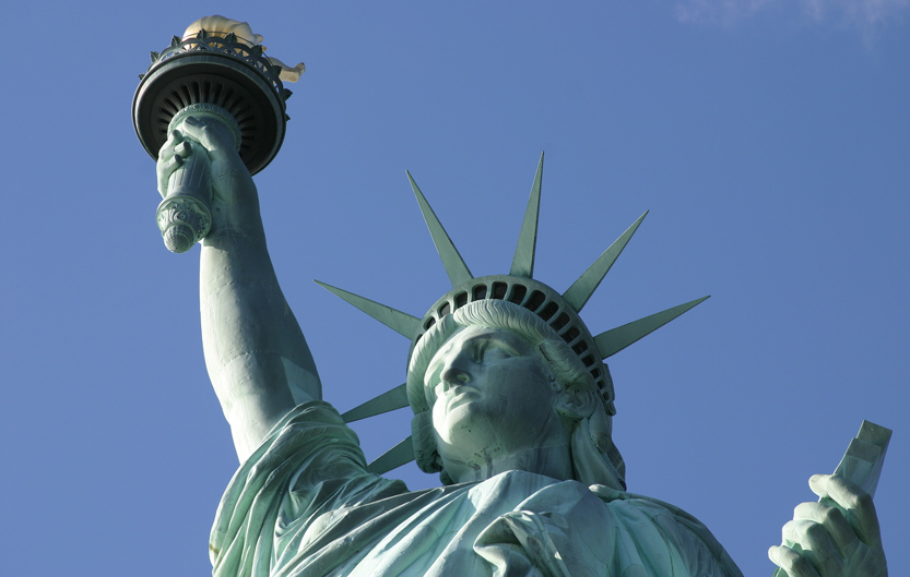Close up of the Statue of Liberty against a blue sky, New York, USA