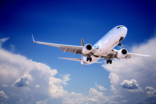 Jet aeroplane in flight against a blue sky