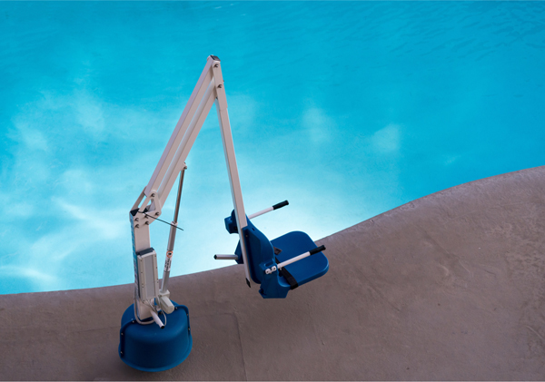 Pool hoist at swimming pool for disabled access
