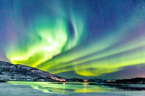 Green Northern Lights in the sky in northern Norway