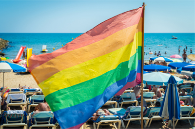 Pride flag on Sitges beach in Barcelona