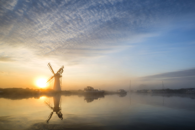 Windmill on the Norfolk Broads at sunset