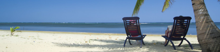 Deck chairs on an exotic beach