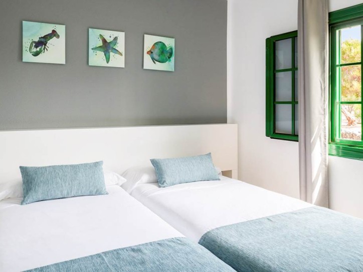 Village-Style Hotel Card image