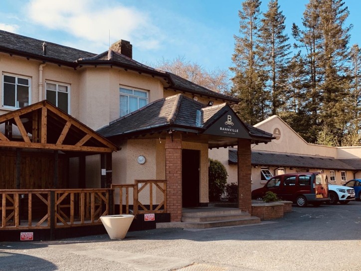 Mature Woodland Hotel Card image
