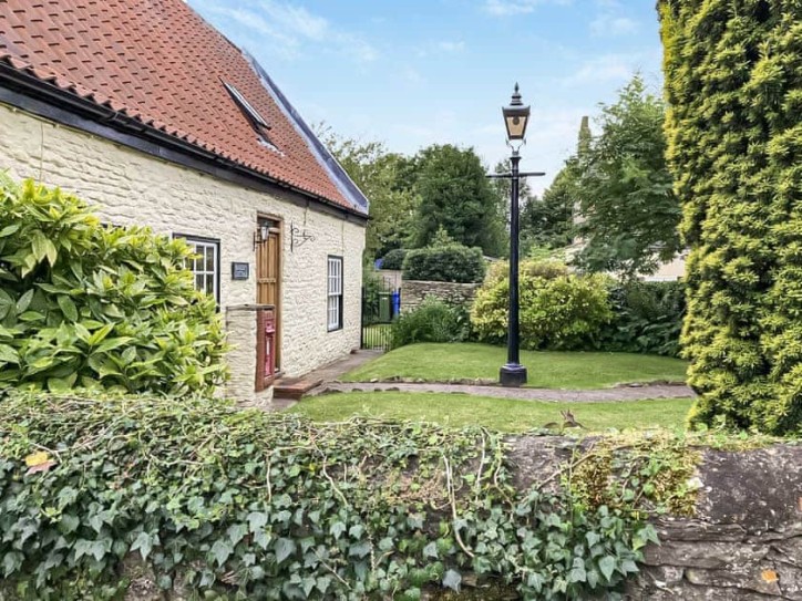 17th-century cottage Card image